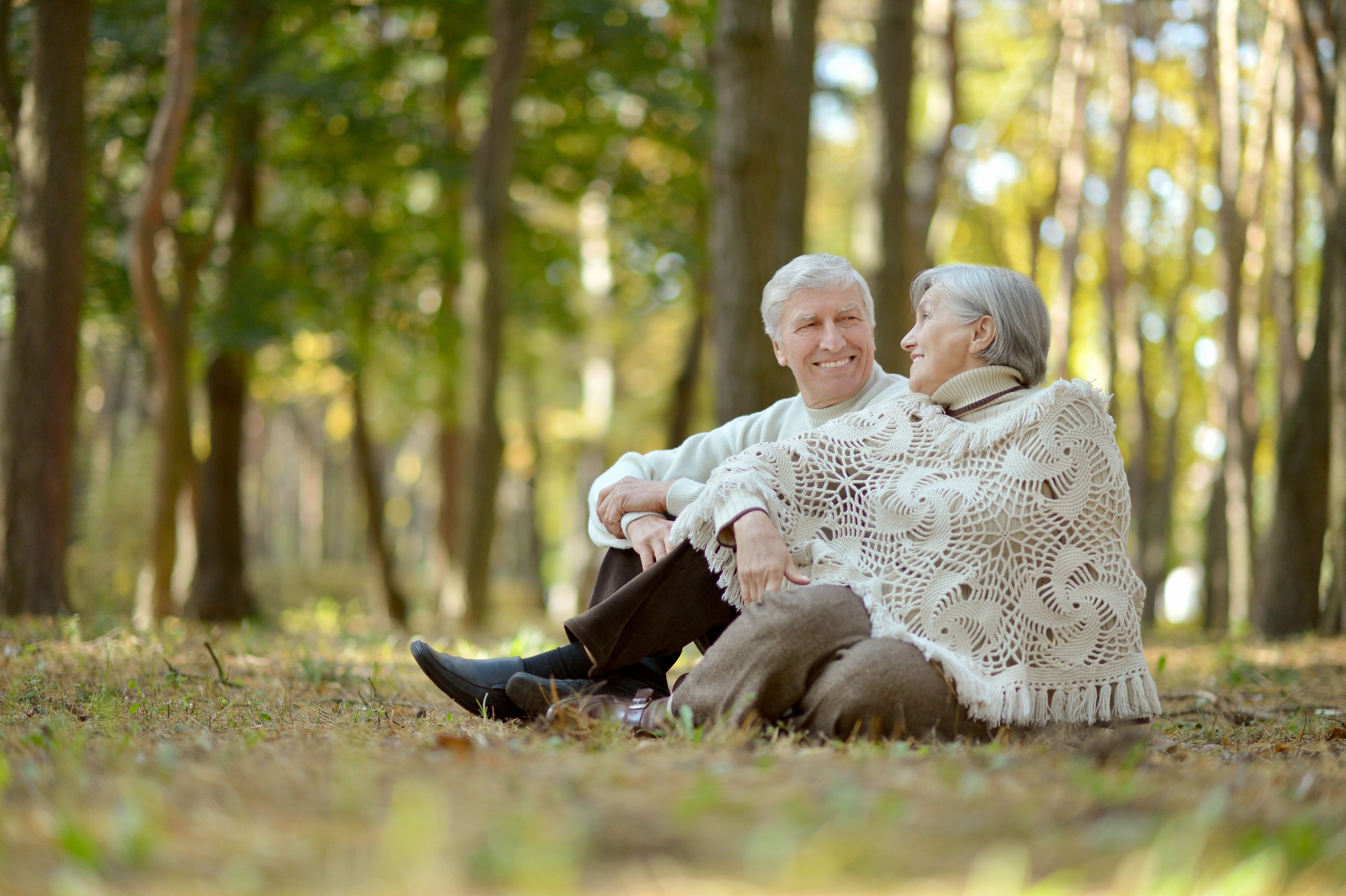 A child supporting his elderly parent elderly parent.